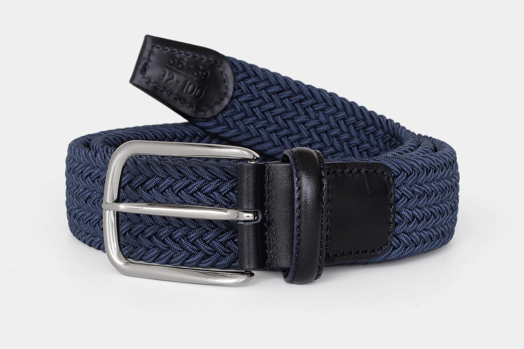 Women’s blue elastic woven belt with silver buckle and Italian leather detail. Made in Italy for all day comfort.
