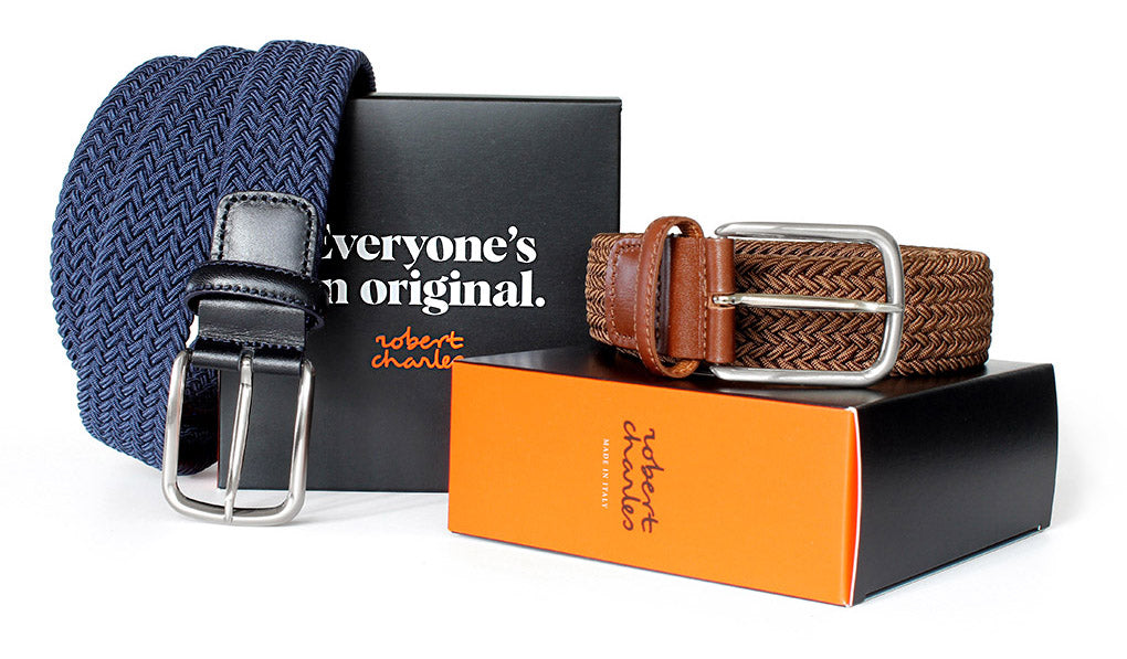 Handcrafted elastic belts with silver buckle, displayed with Robert Charles gift box. Handmade in Italy.