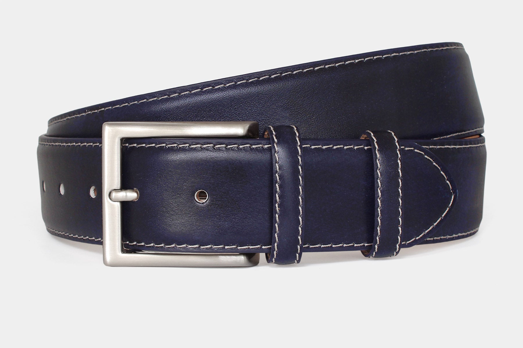 Men’s navy vegetable-tanned Italian leather belt handmade in Italy with silver buckle and contrast stitching.