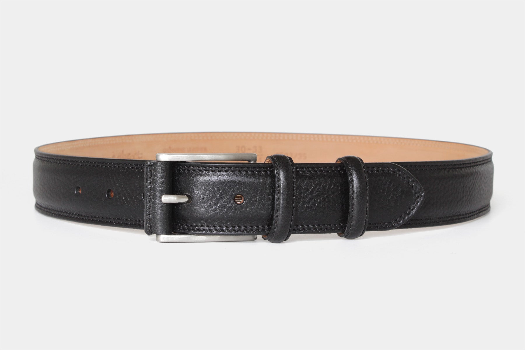 Men’s black grained Italian leather belt detail with double stitching and solid brass buckle with leather cover.