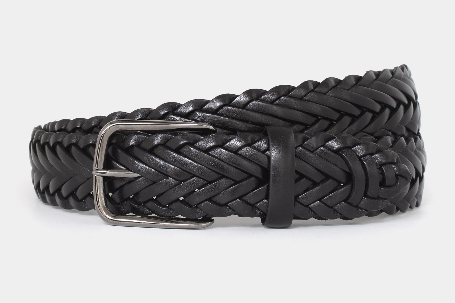Men’s black braided leather belt with gunmetal buckle. Handwoven in Italy from Italian solid hide.