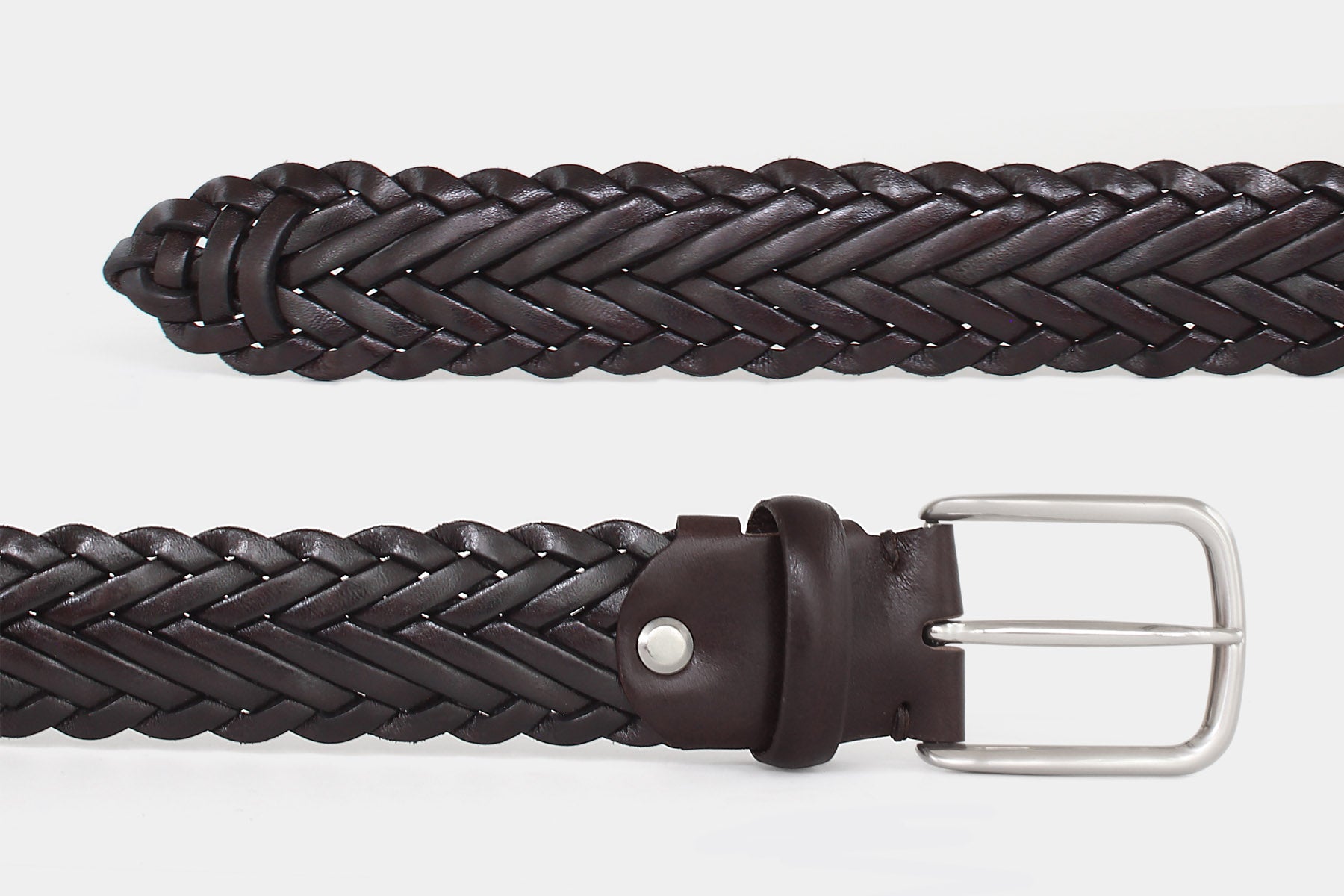 Men’s brown braided solid hide leather belt with silver buckle. Handwoven by artisans in Italy.