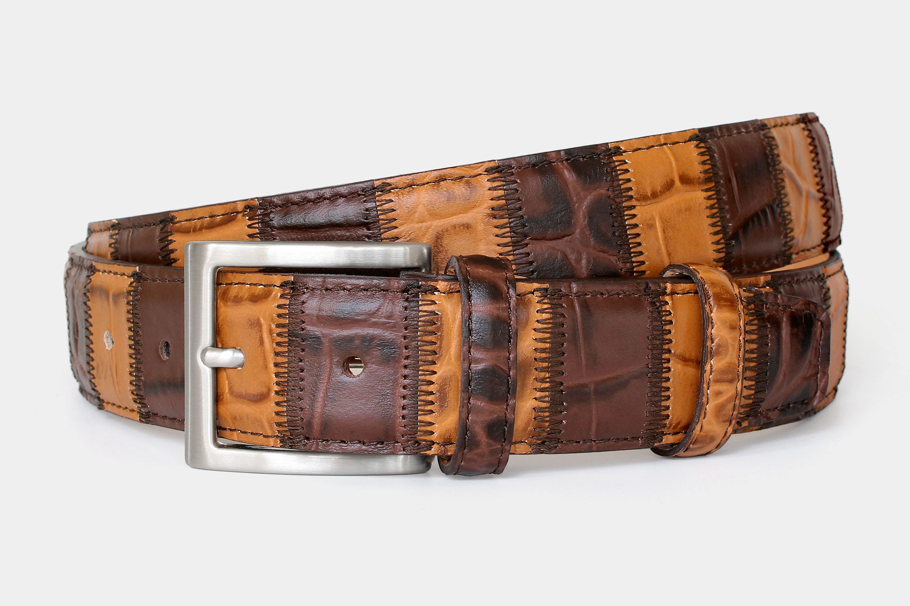 Men’s Italian leather patchwork belt in brown and tan, with solid brass buckle. Individually handcrafted in Italy.