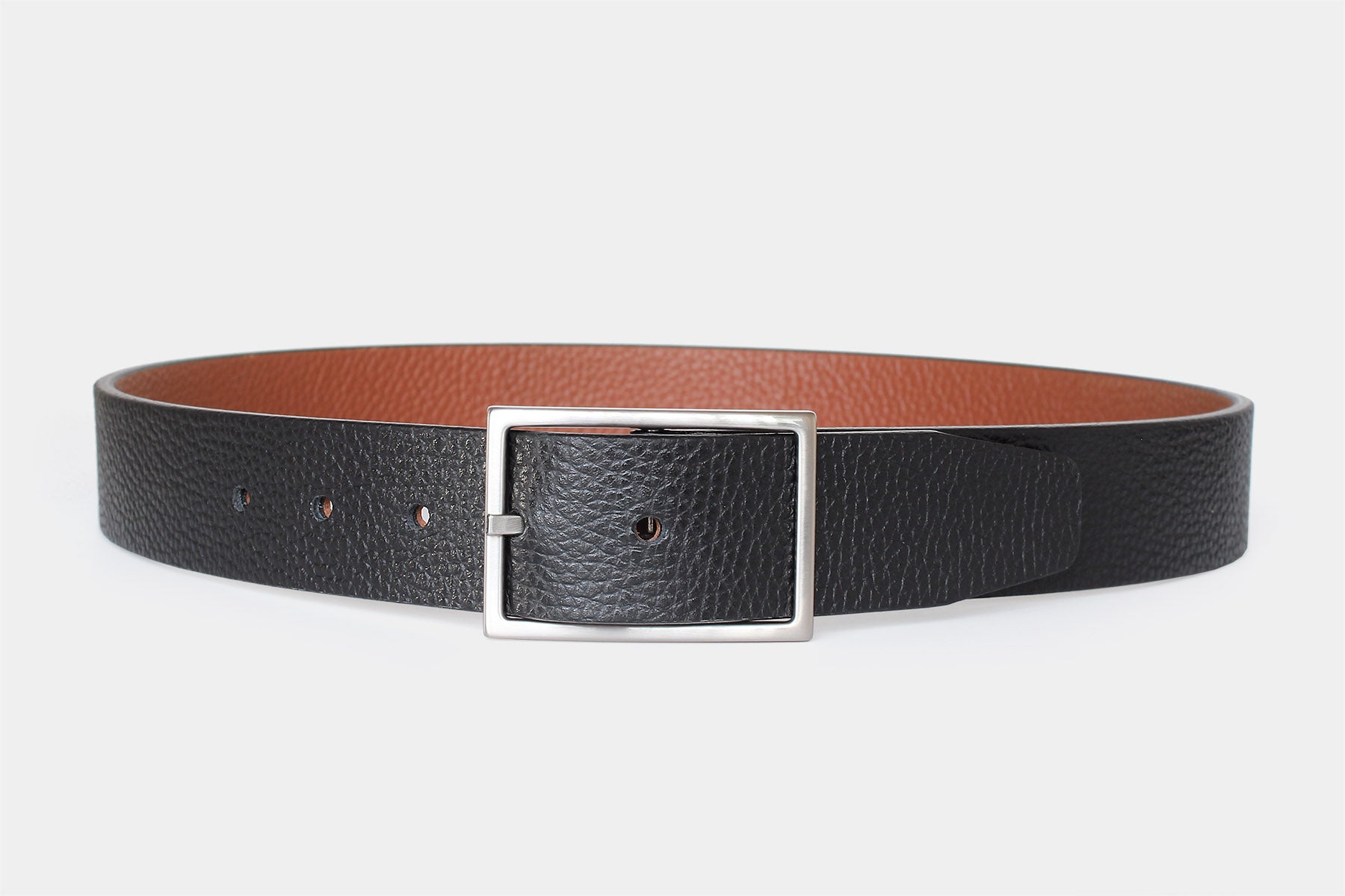 Men’s reversible black and tan leather belt, handmade in Italy from genuine leather with a silver buckle.
