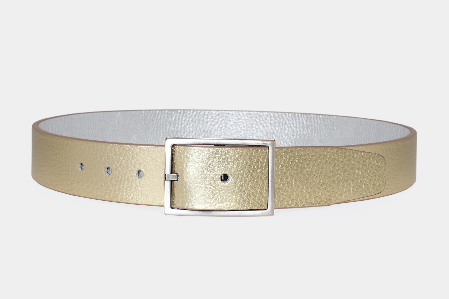 Handcrafted Italian reversible leather belt in champagne gold and silver with polished silver buckle