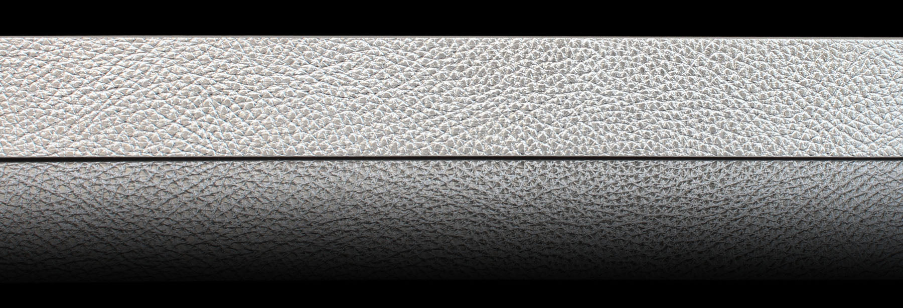 Silver metallic grained leather belt detail. Handmade in Italy.