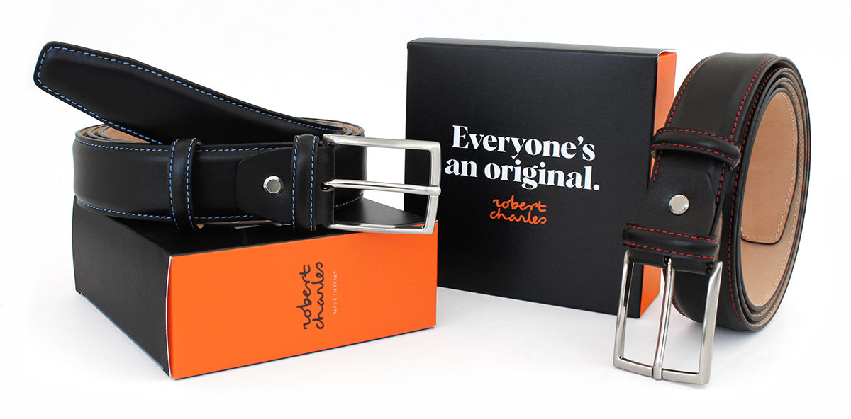 Premium black calfskin Italian leather belts with contrast stitching, displayed with Robert Charles gift box