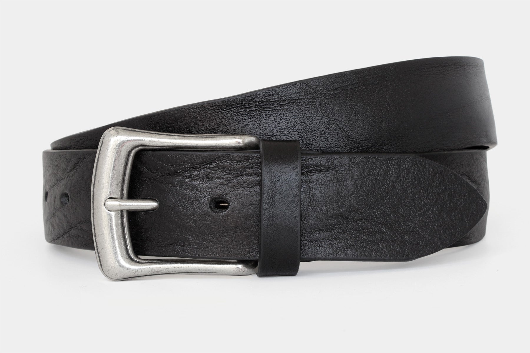 Men’s black Italian solid hide leather jeans belt with western style buckle. Raw cut and vegetable tanned.