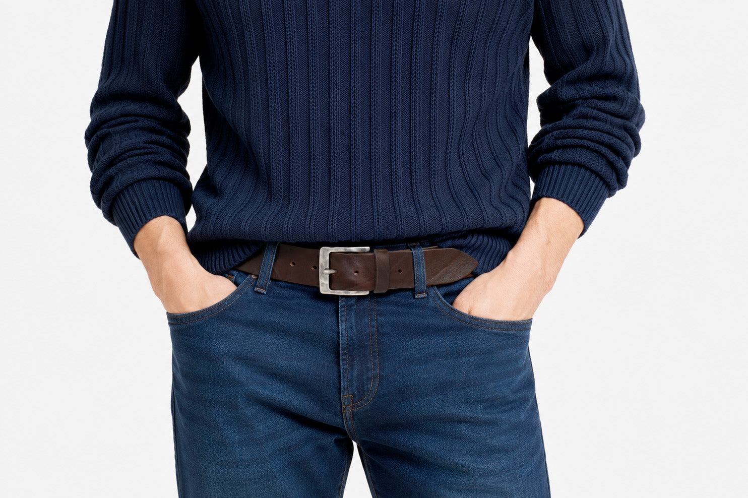 Brown solid hide leather belt with weathered buckle styled with jeans
