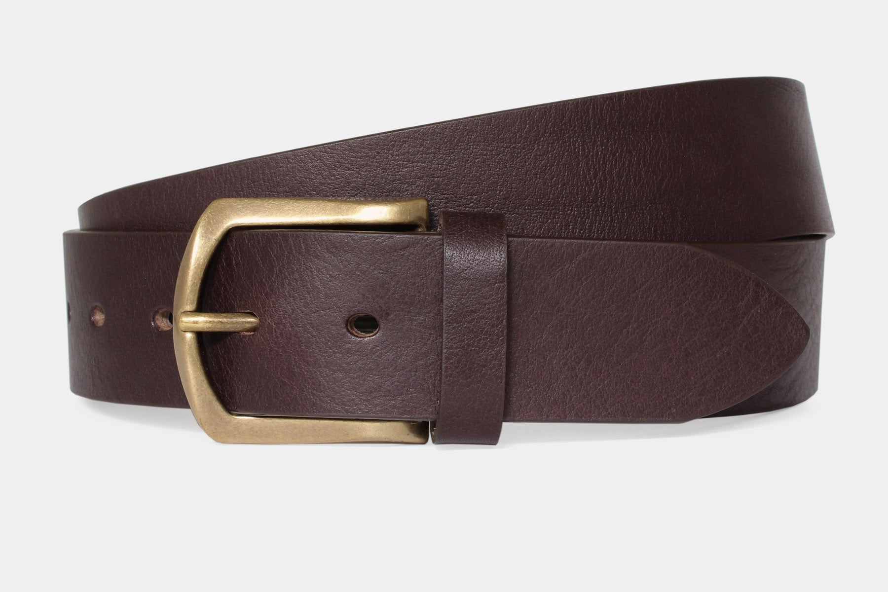 Men’s brown Italian solid hide leather jeans belt with weathered buckle. Raw cut and vegetable tanned.