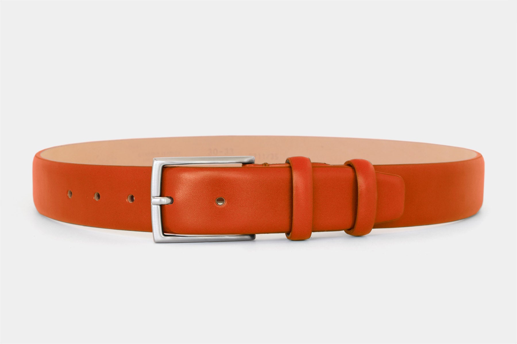 Men’s orange smooth genuine Italian leather belt with classic solid brass buckle and feather edge finish.