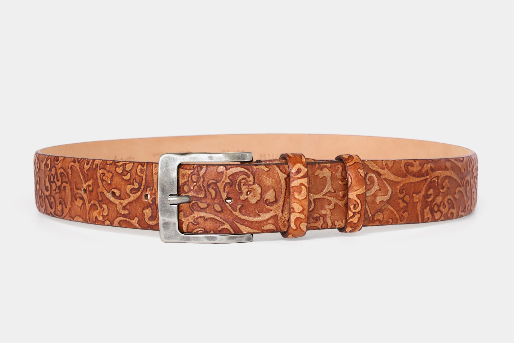 Men’s tan Italian genuine leather belt with weathered buckle and floral embossing. Handmade in Italy.