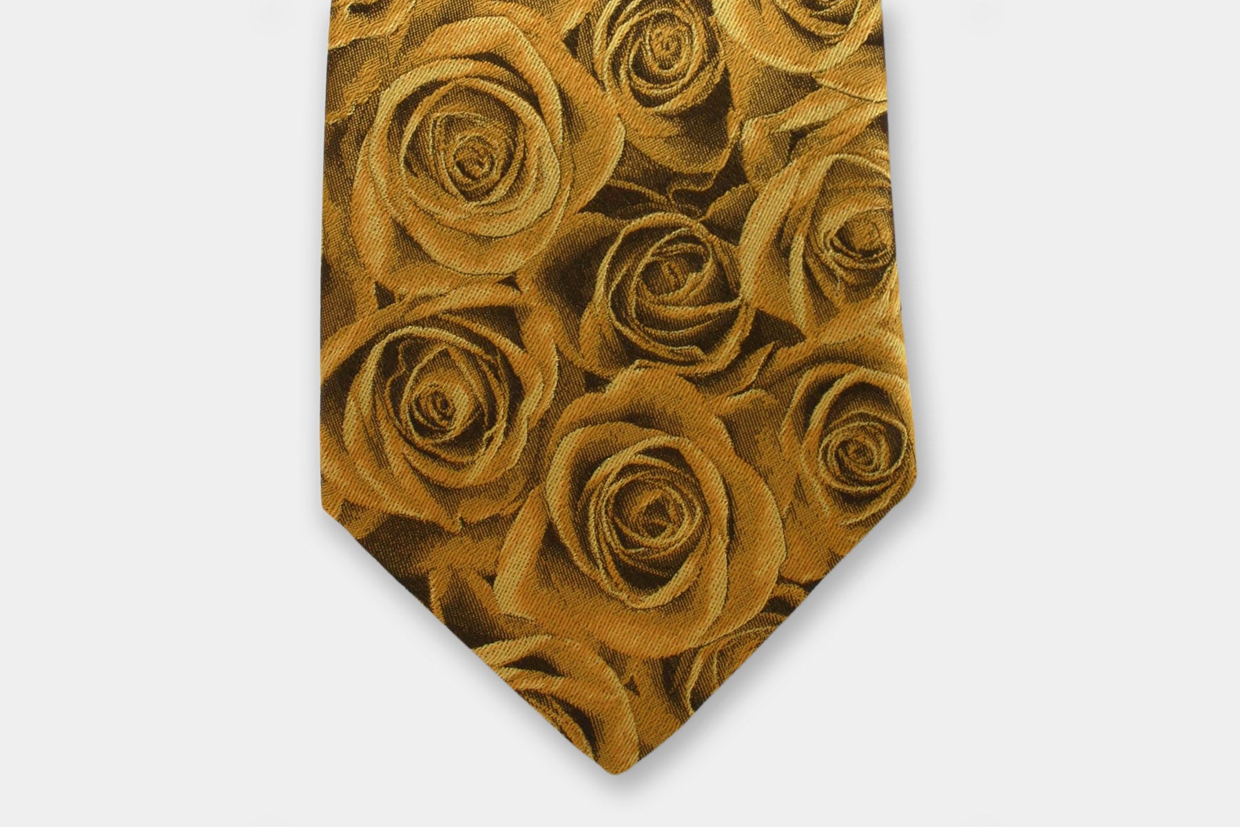 Close-up of a Robert Charles rose gold silk tie highlighting the fine Italian craftsmanship and intricate weave.