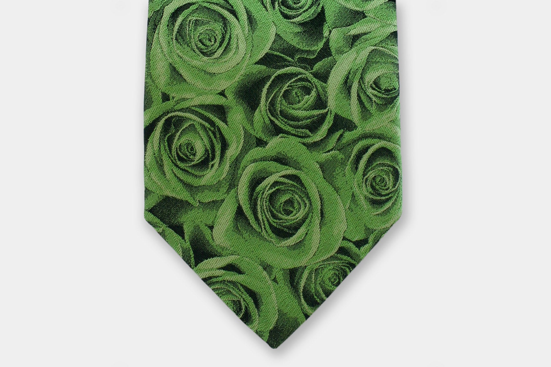 Close-up of a Robert Charles rose green silk tie showcasing the fine Italian craftsmanship and intricate weave.