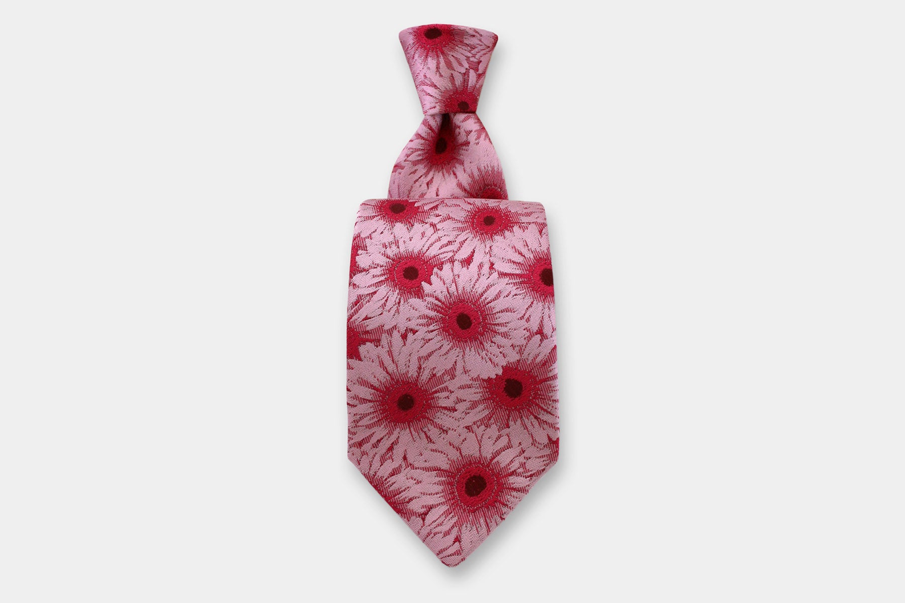 Robert Charles gerbera pink silk tie. Handmade in Italy, presented with a classic knot.