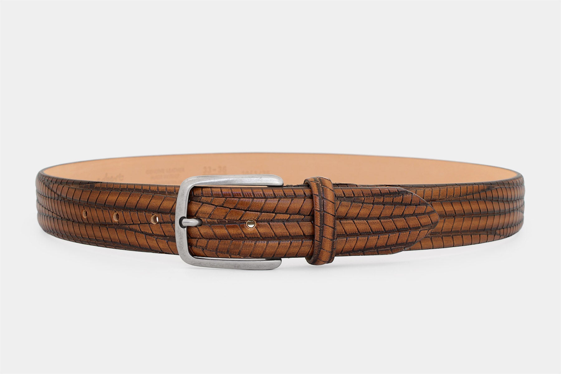 Men's tan embossed genuine leather belt handmade in Italy with silver buckle.