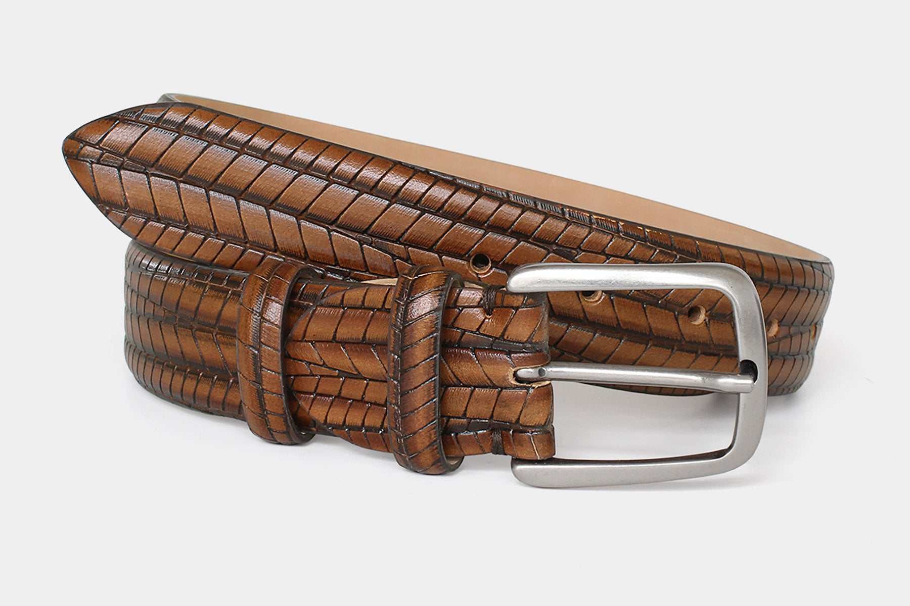 Men's tan embossed genuine leather belt handmade in Italy with silver buckle, stitching and texture detail