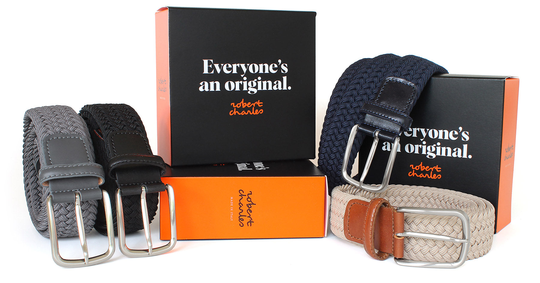 Handcrafted braided elastic belts with silver buckle, displayed with Robert Charles gift box. Handmade in Italy.