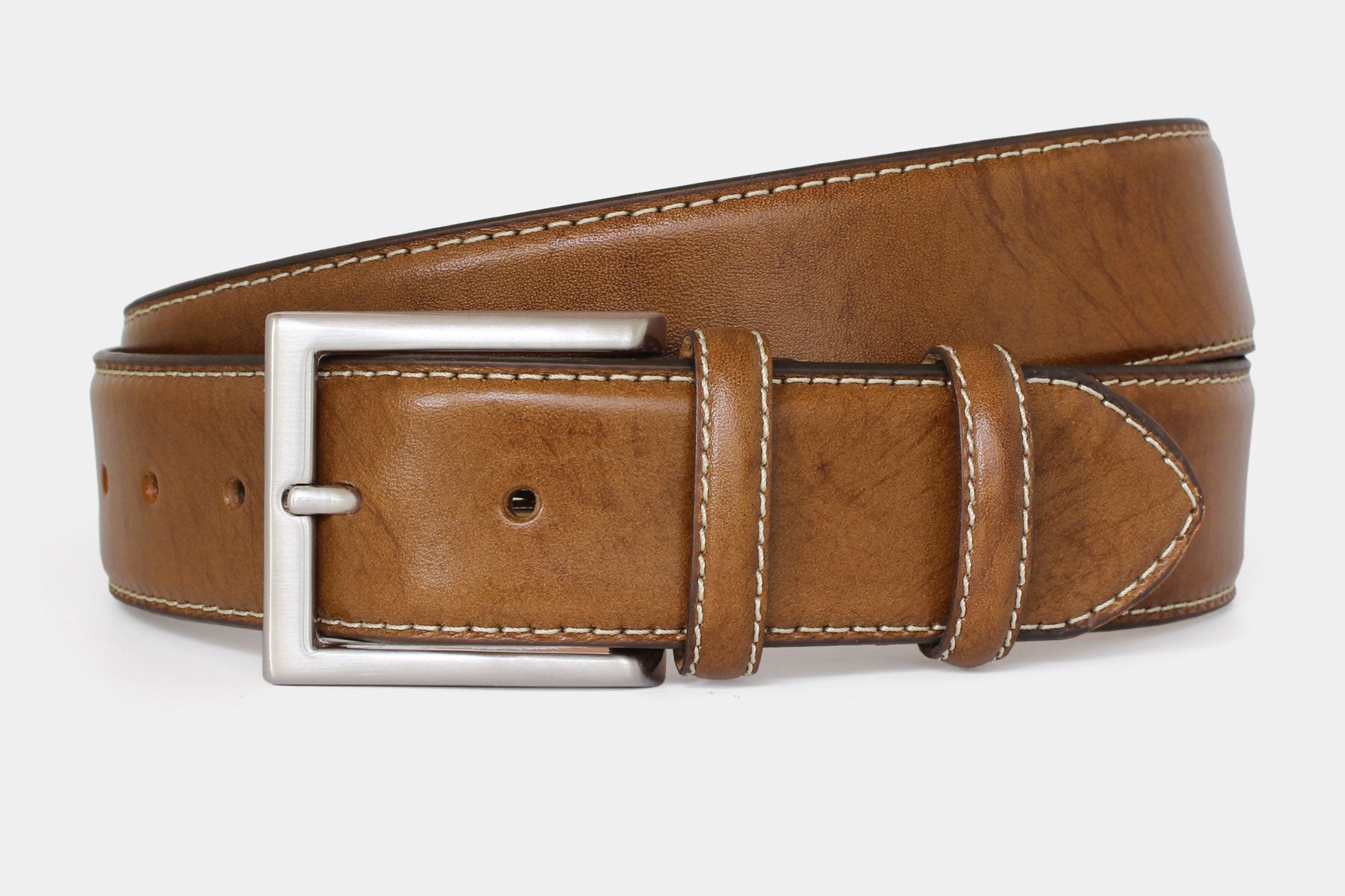 Men’s tan vegetable-tanned Italian leather belt handmade in Italy with silver buckle and contrast stitching.