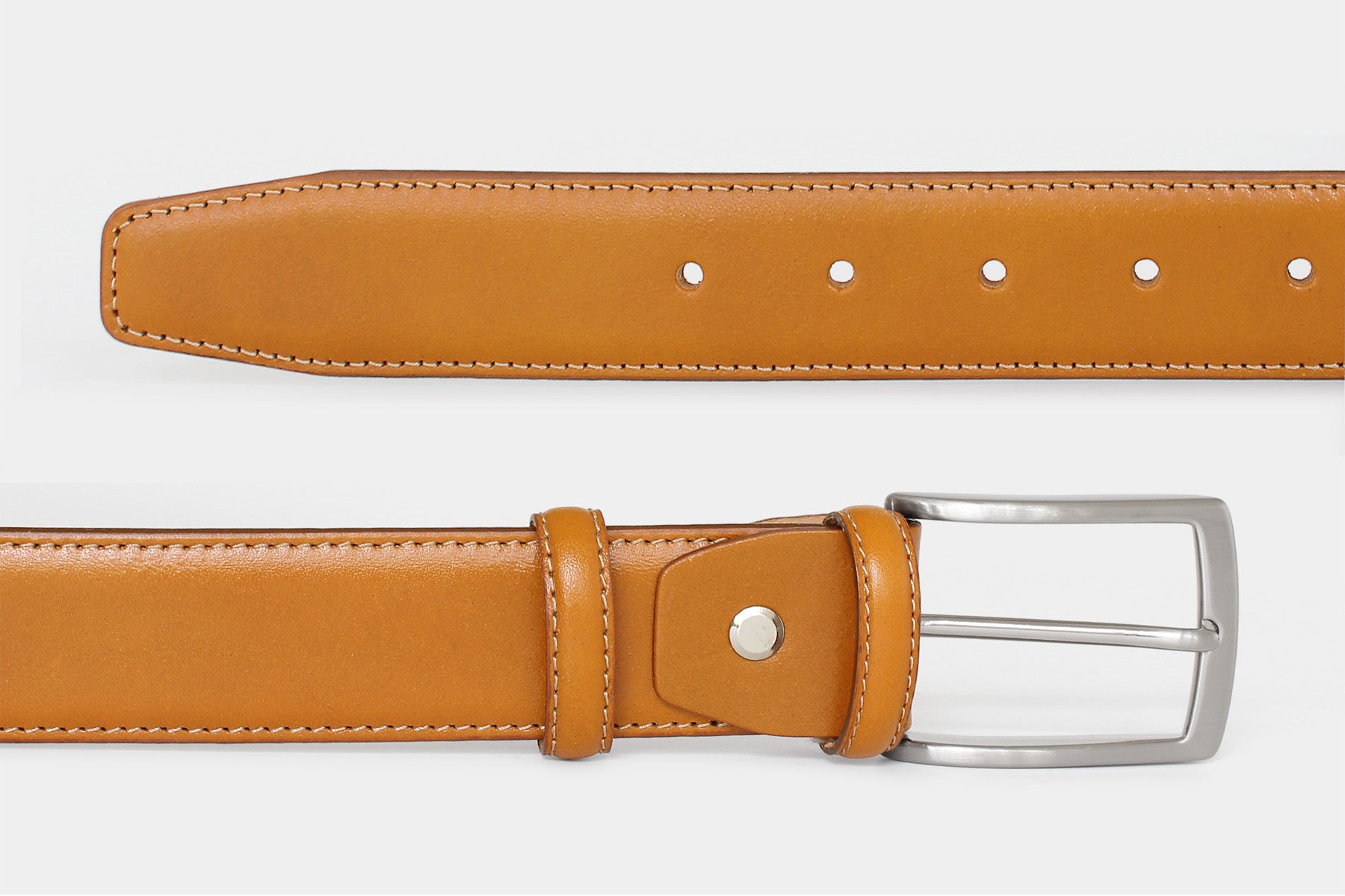 Men’stan smooth Italian leather belt, detail view of leather and classic solid brass buckle. Handmade in Italy.