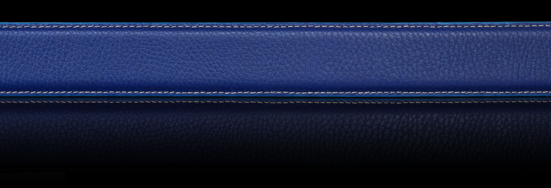 Blue grained genuine leather belt stripe on black background