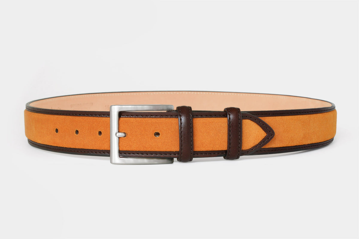 Men’s orange suede Italian leather belt with smooth brown contrast leather edging and a silver brass buckle.