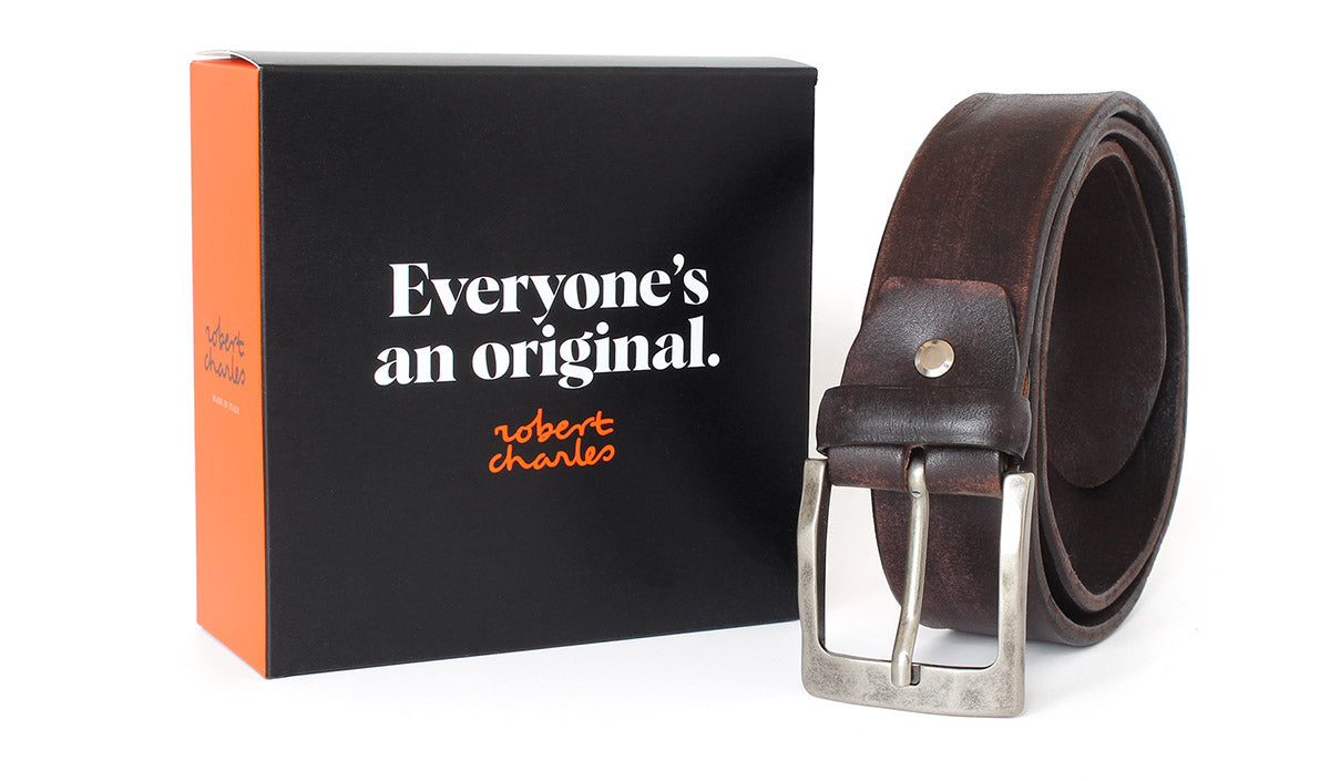 Premium solid hide Italian leather belt with weathered buckle, displayed with Robert Charles gift box 