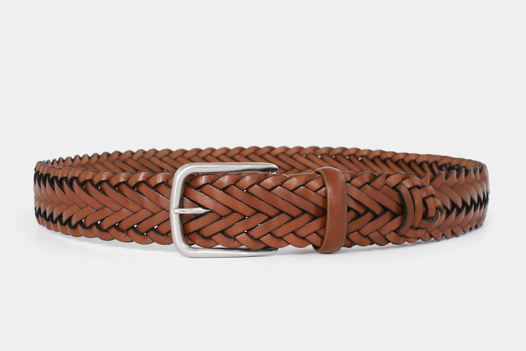 Men’s tan braided belt. Handwoven Italian solid hide leather with silver buckle. Handmade in Italy.