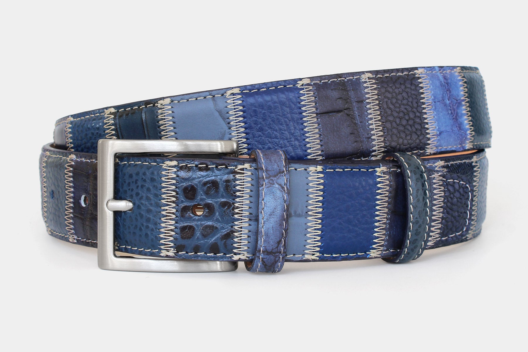 Men’s Italian leather patchwork belt in tones of blue, with solid brass buckle. Individually handcrafted in Italy.
