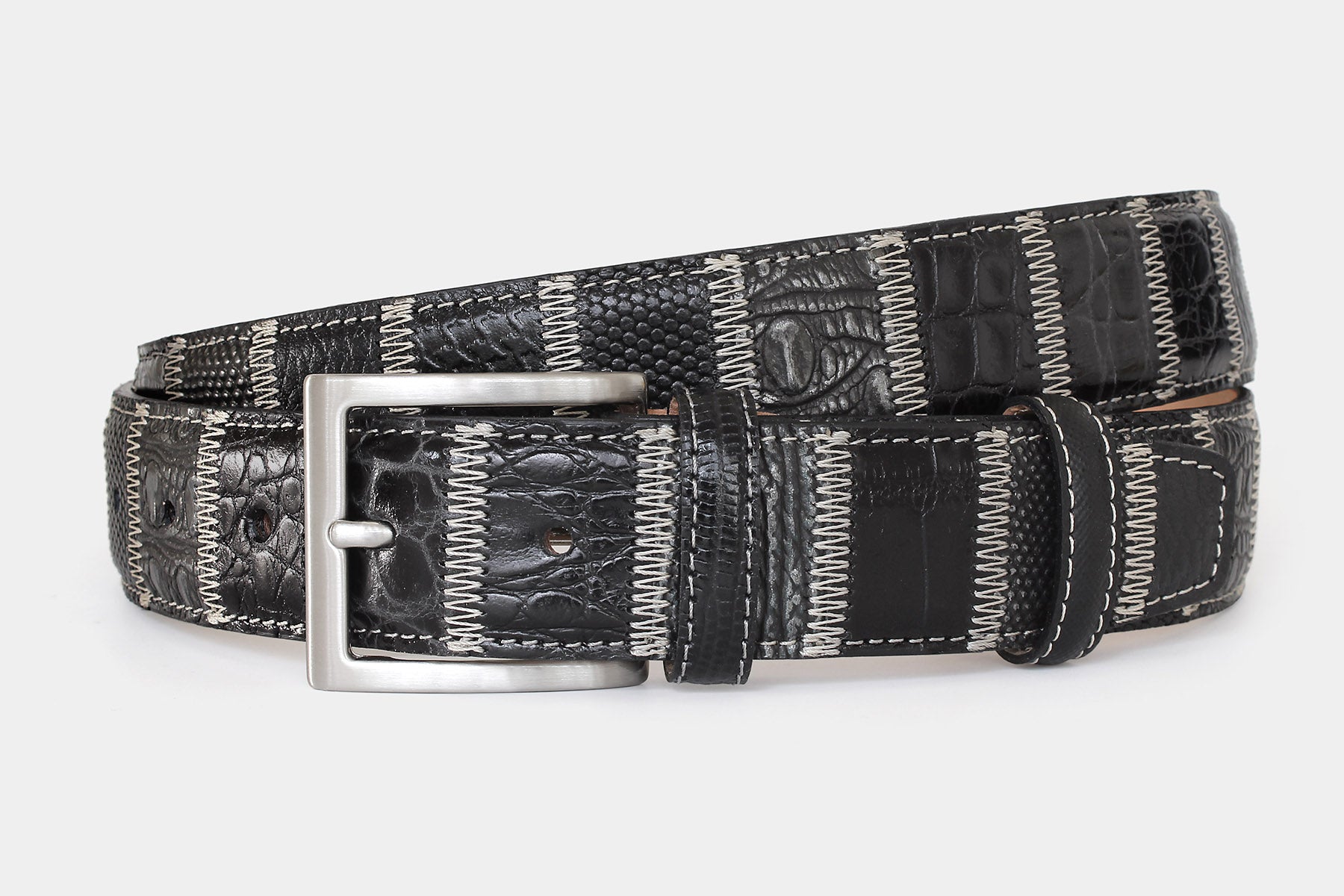 Men’s Italian leather patchwork belt in black, with solid brass buckle. Individually handcrafted in Italy.