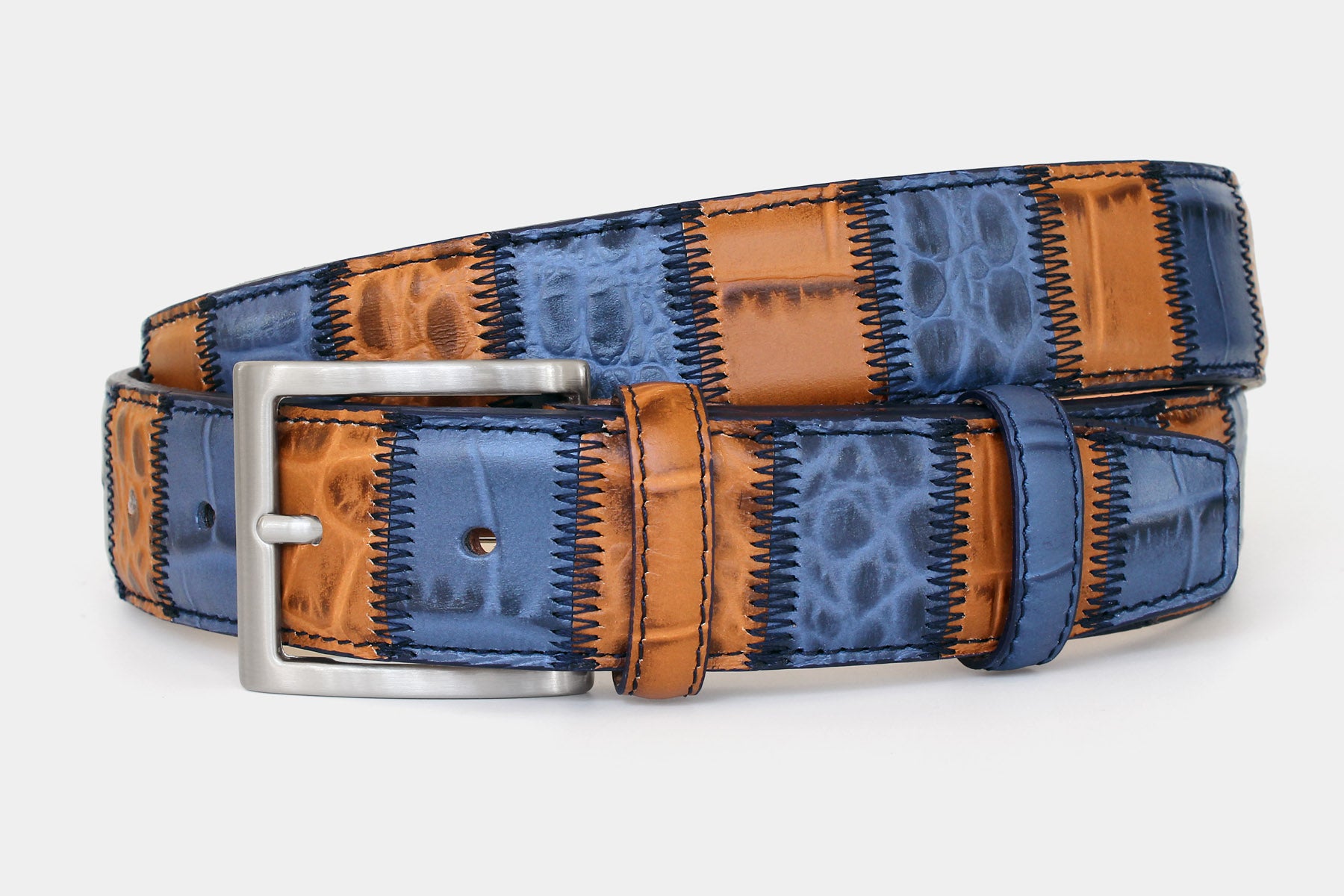 Men’s Italian leather patchwork belt in blue and tan, with solid brass buckle. Individually handcrafted in Italy.