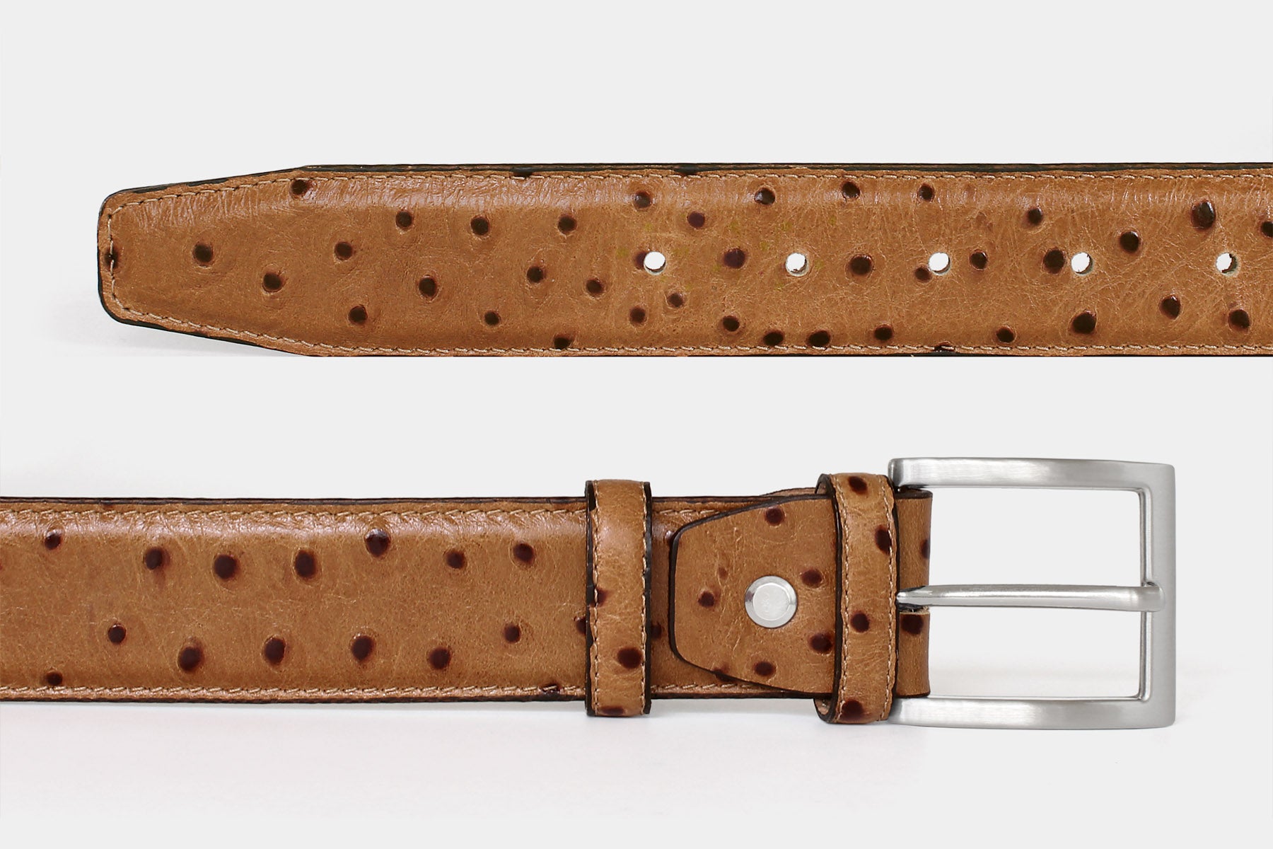 Men’s tan ostrich Italian leather belt, detail view of leather and solid brass buckle. Handmade in Italy.