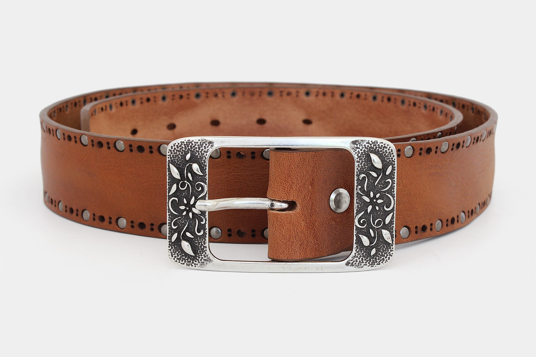 Women's tan solid hide leather jeans belt with studded detail and a floral buckle. Handmade in Italy.