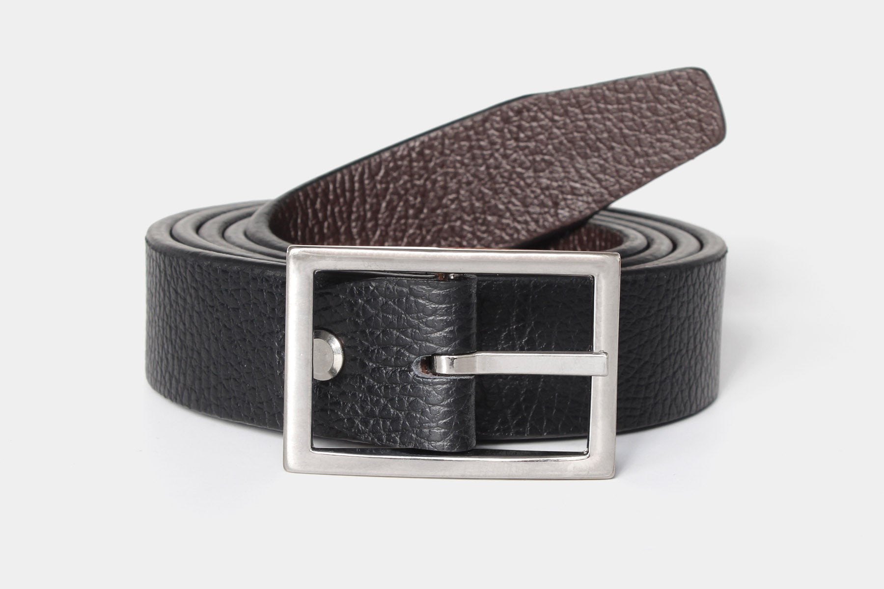 Reversible slim men’s belt in black and brown genuine leather. Handmade in Italy with a silver buckle.