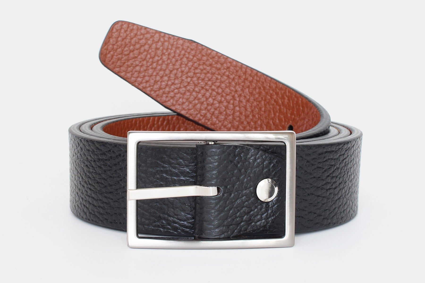 Reversible men’s belt in black and tan genuine leather. Handmade in Italy with a silver buckle.