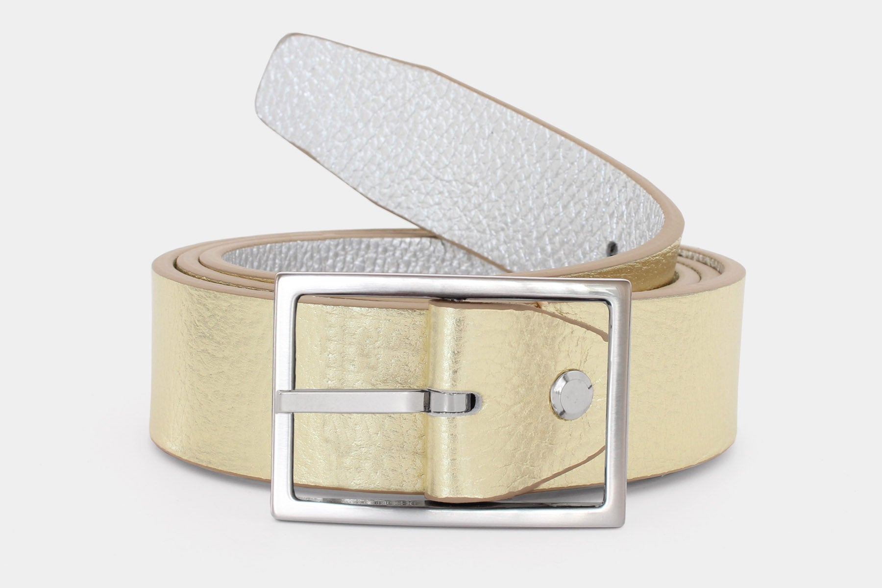 Women's reversible soft Italian grained leather belt with a feather edge finish in metalic gold and silver. Made in Italy.