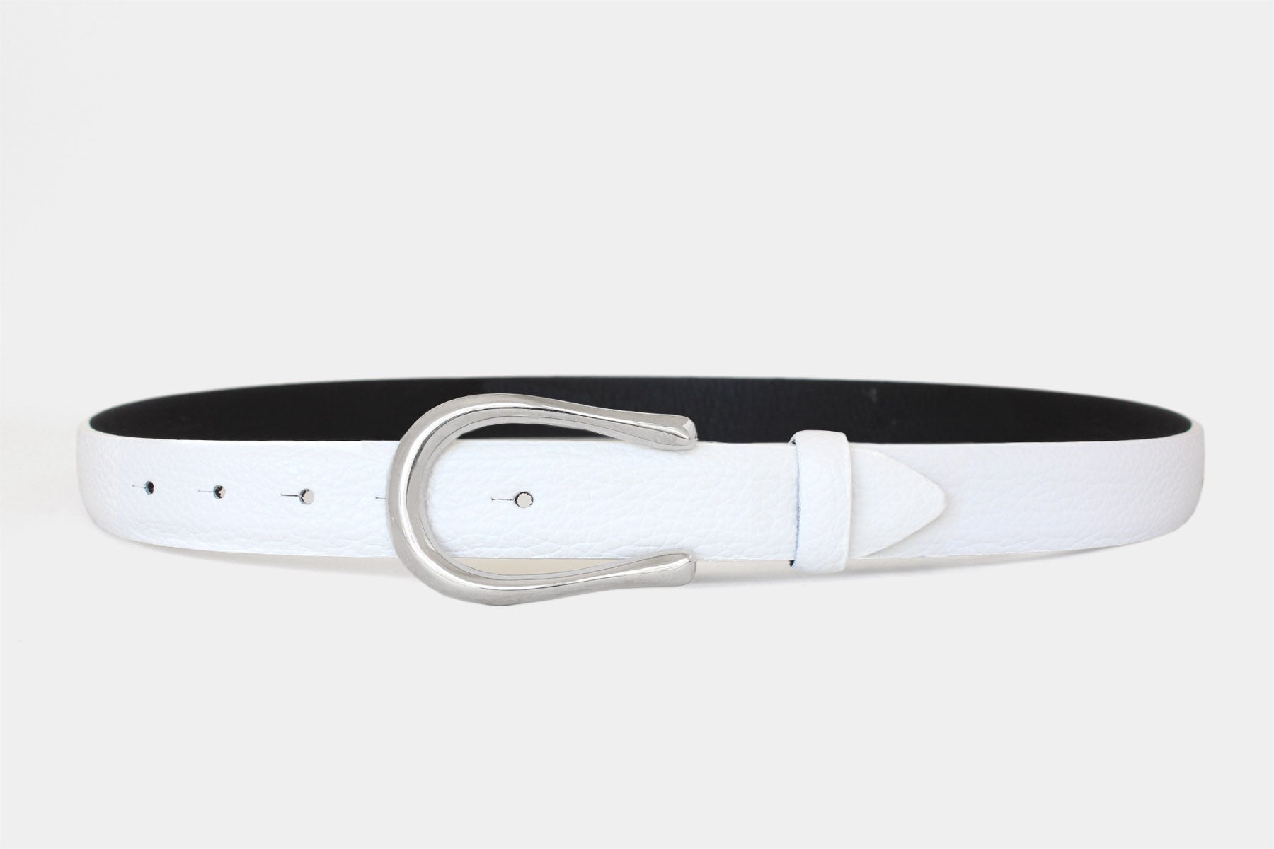 Women’s white slim Italian grained leather belt with silver buckle and black lining. Handmade in Italy. 