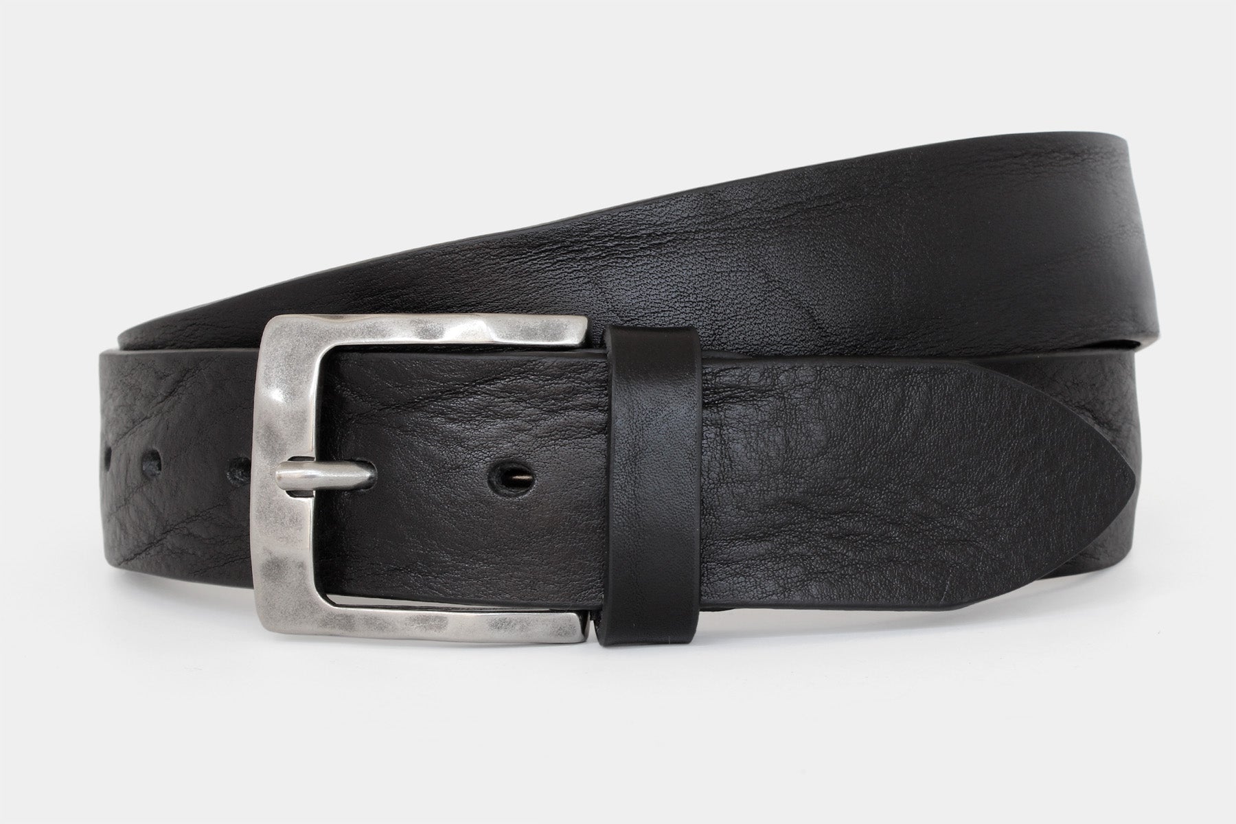 Men’s black Italian solid hide leather jeans belt with weathered buckle. Raw cut and vegetable tanned.