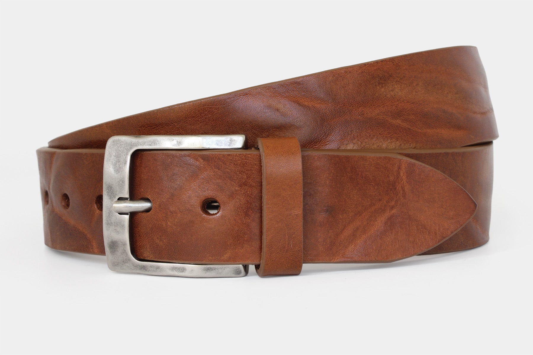 Men’s tan Italian solid hide leather jeans belt with weathered buckle. Raw cut and vegetable tanned.