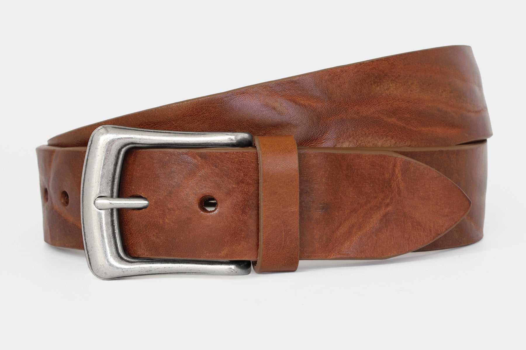 Men’s tan Italian solid hide leather jeans belt with western style buckle. Raw cut and vegetable tanned.
