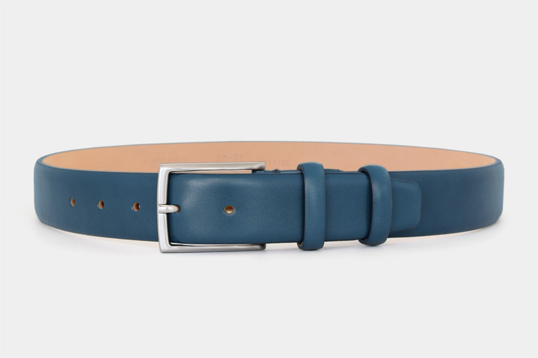 Men’s blue smooth genuine Italian leather belt with classic solid brass buckle and feather edge finish. 