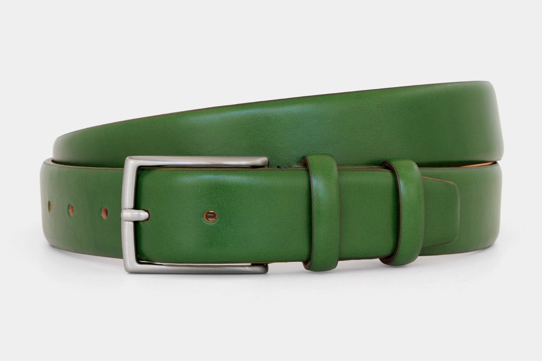 Men’s green Italian leather belt with classic solid brass buckle and feather edge finish. Handmade in Italy.