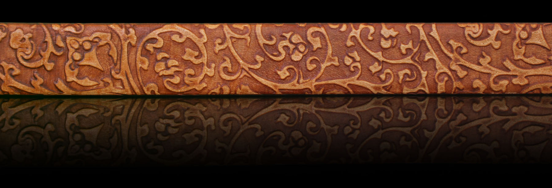 Men’s tan Italian genuine leather with  floral embossing on black background