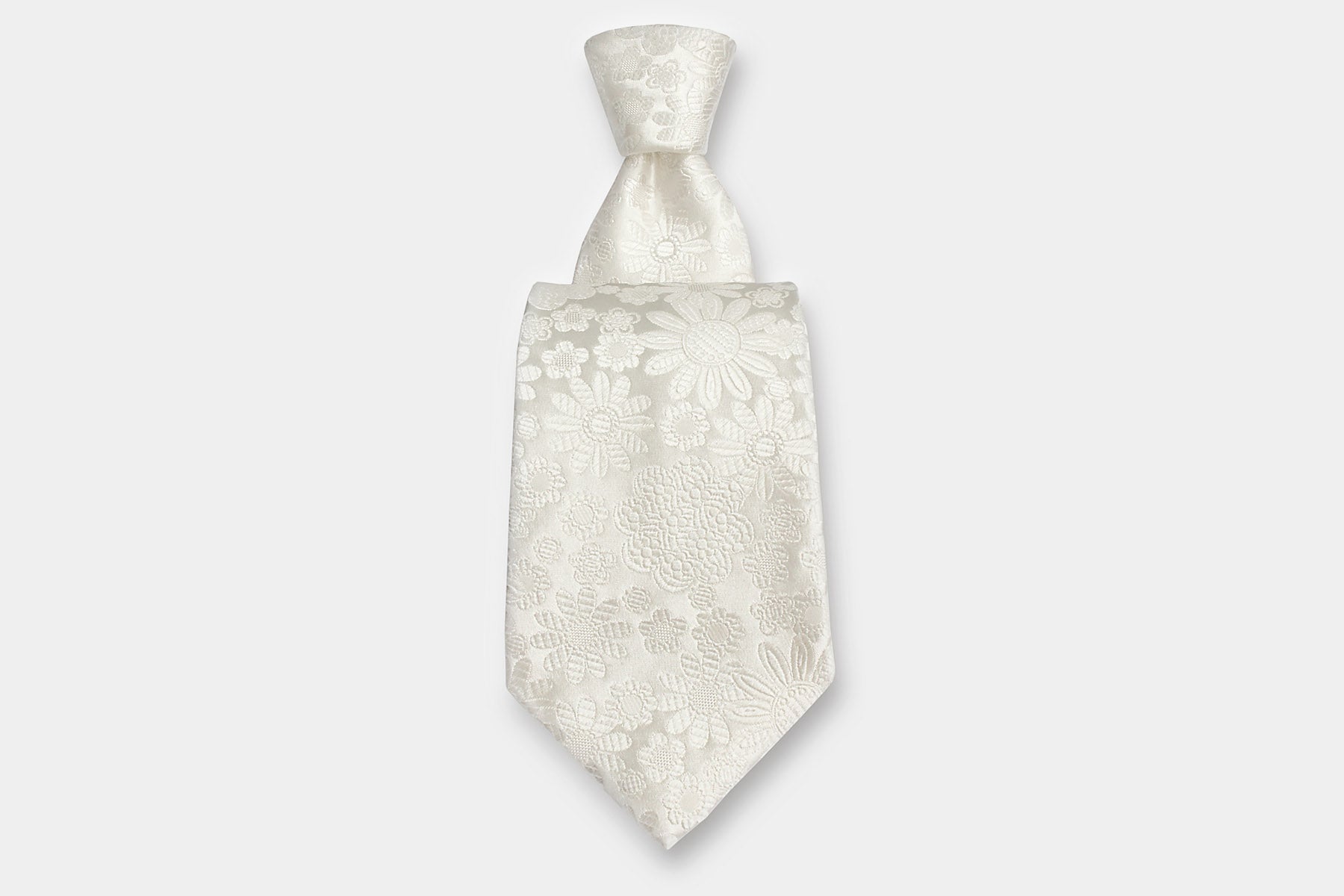 Robert Charles silk tie with an intricate jacquard floral weave in soft ivory - perfect for weddings. Handmade in Italy.