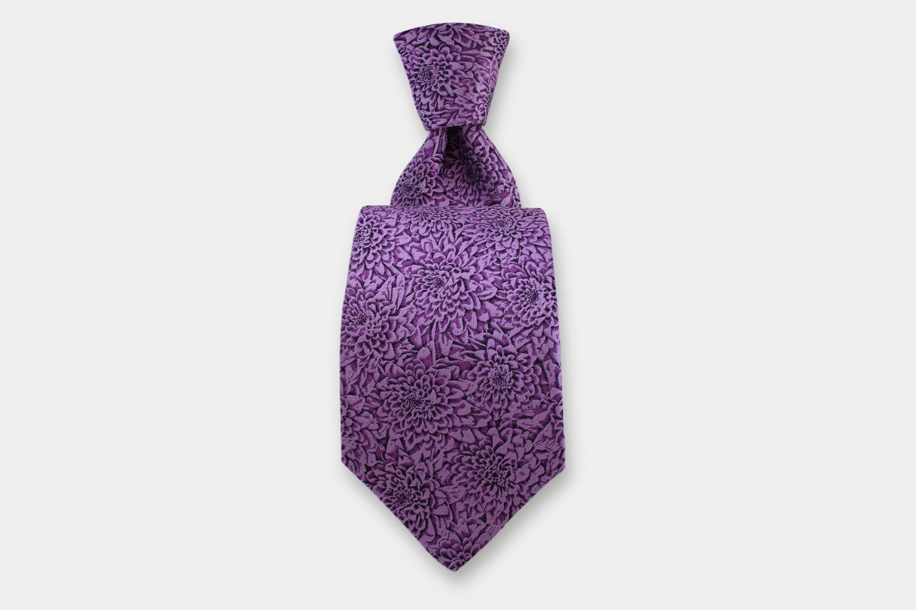 Robert Charles purple chrysanthemum silk tie. Handmade in Italy, presented with a classic knot.