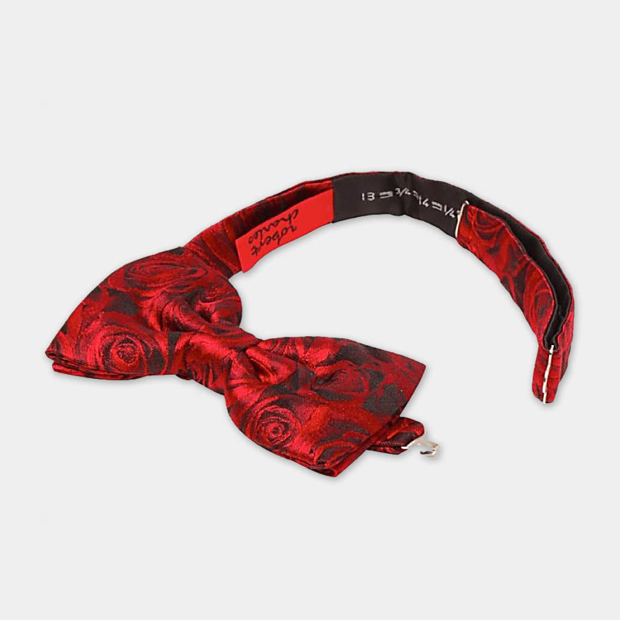 Robert Charles red rose silk bow tie pre-tied showcasing adjustable neck strap for a tailored fit. Handmade in Italy